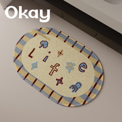 Decorative Oval Checkered Entrance Mat with Embroidered 'Life' Script and Non-Slip Backing