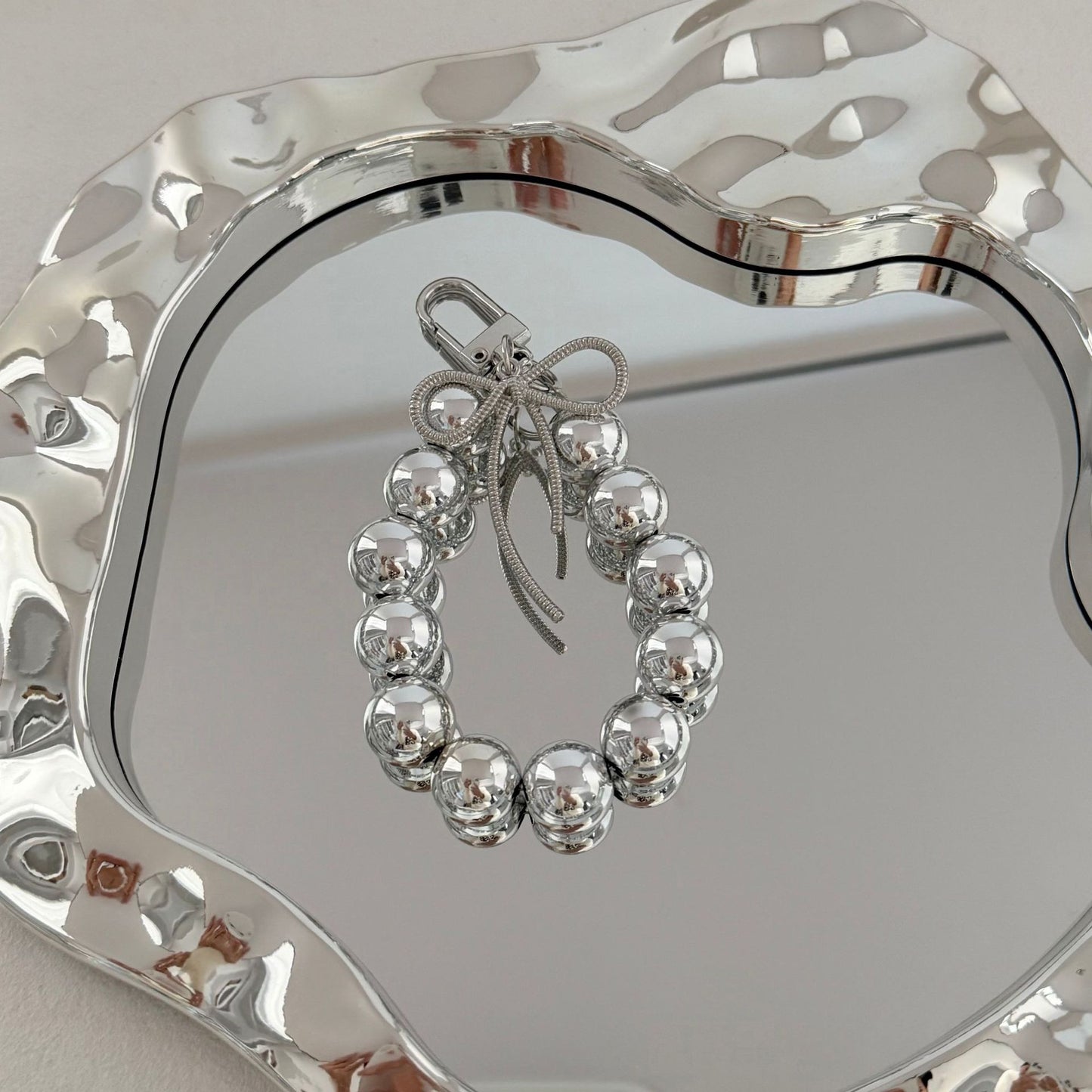 Eleganter Perlencharms-Schlüsselanhänger Brehn