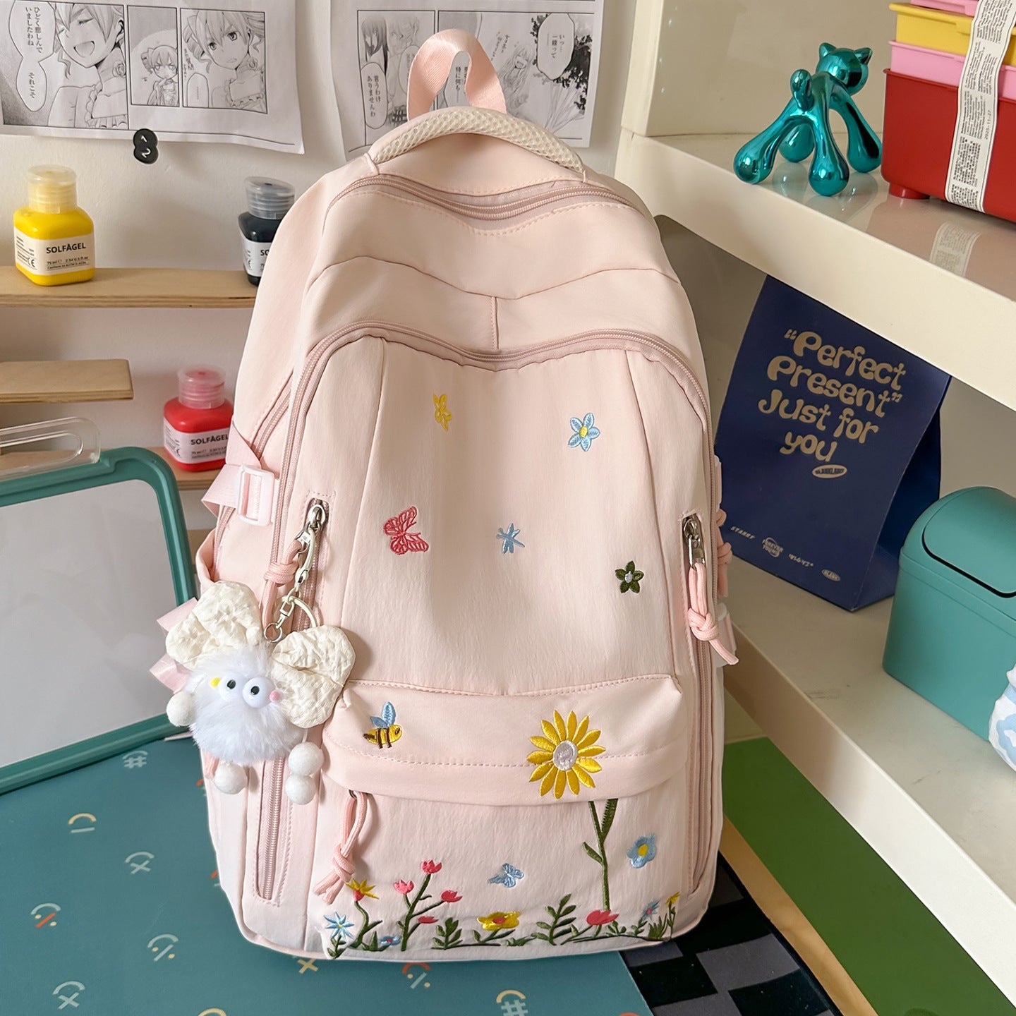 Besticketer floraler Detail Schulrucksack
