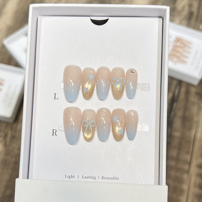 Dekorativer Press-On-Nagelsatz mit Glitzer und Schleifenakzenten Brehn
