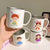 Keramiktasse mit Fröhlichem Familienmotiv Brehn 1786635457