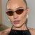 Damen Cat-Eye Sonnenbrille mit strassbesetztem Rahmen und schützenden Gläsern Brehn