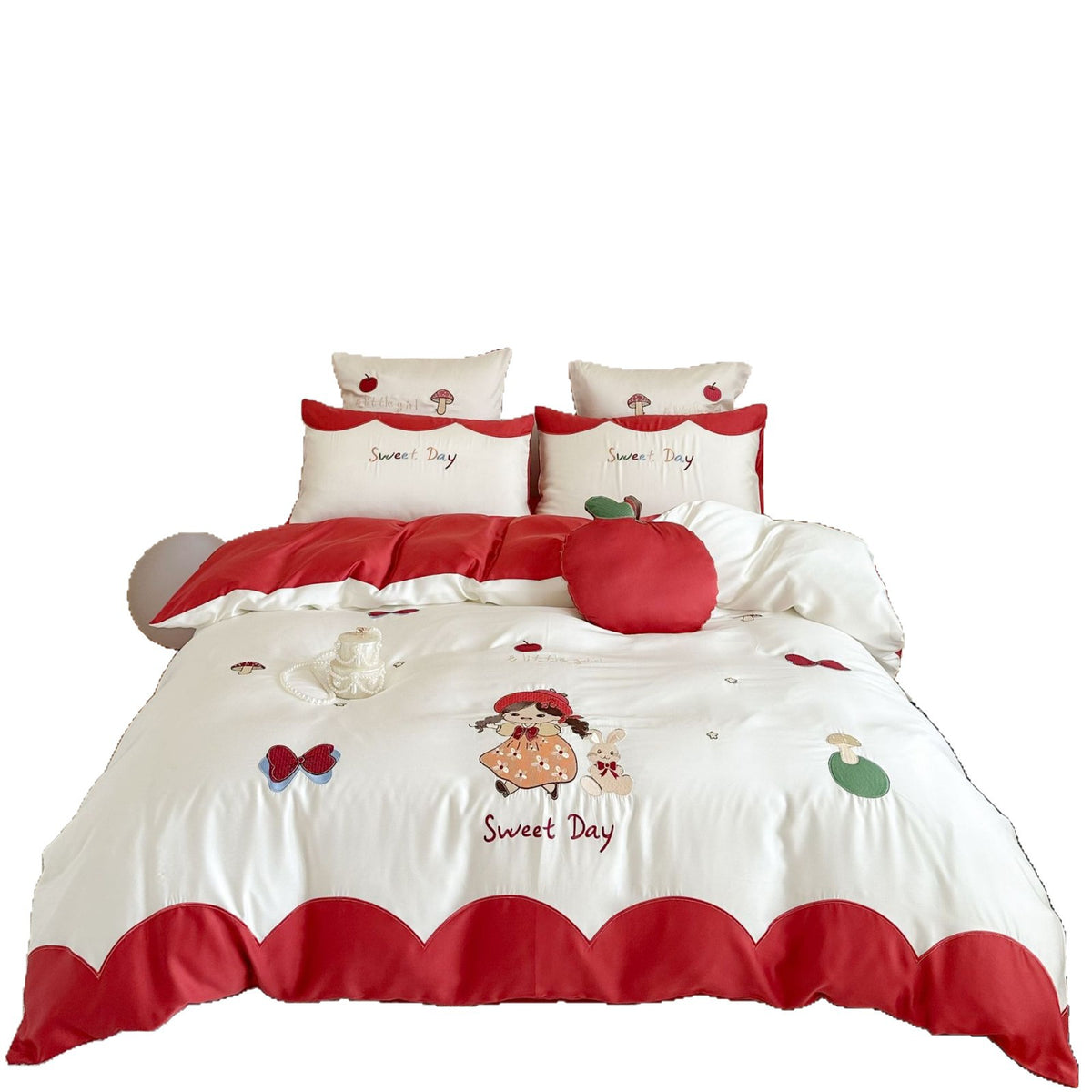 Bettwäsche-Set mit bestickten Puppen- und Apfelmotiven