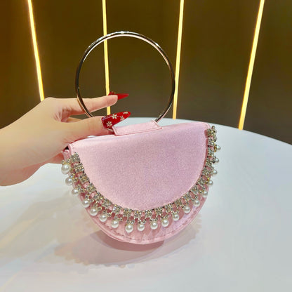 Perlenakzentierte Abend-Clutch