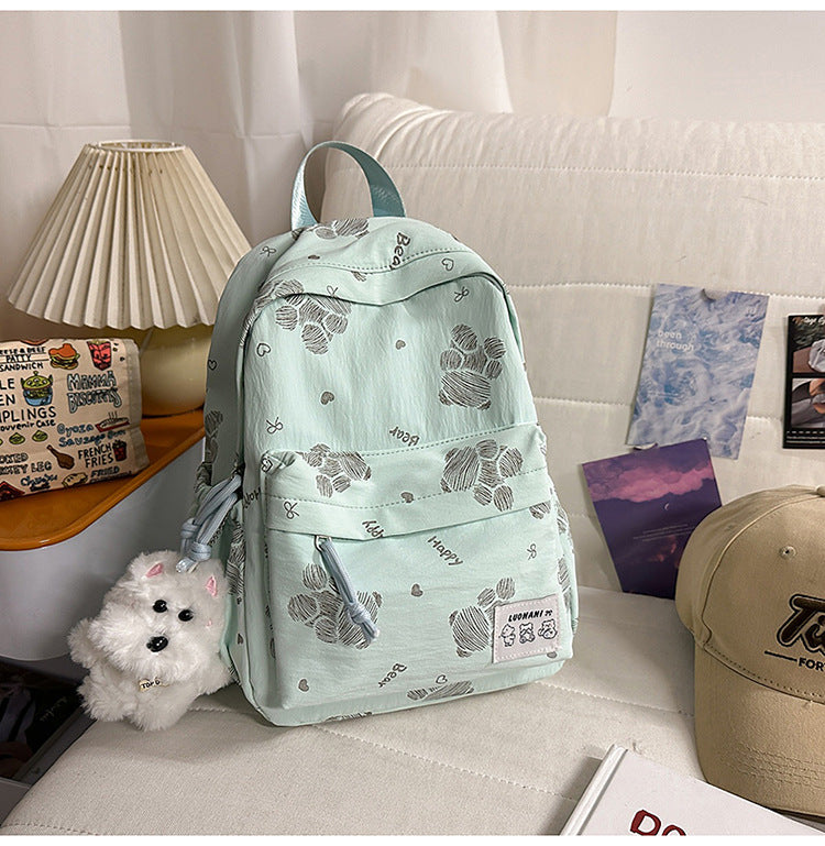 Niedlicher gemusterter Canvas-Schulrucksack