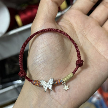 Schmetterlingsanhänger geknotetes Armband Brehn