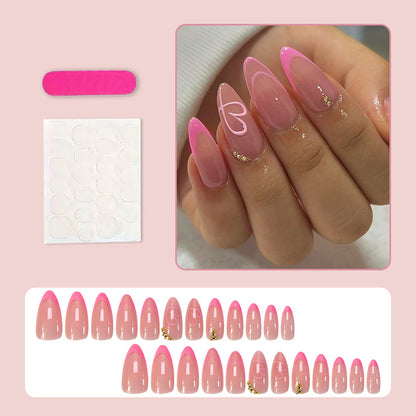 Kunstnagelset mit eleganter Herz- und Glitzerverzierung Brehn
