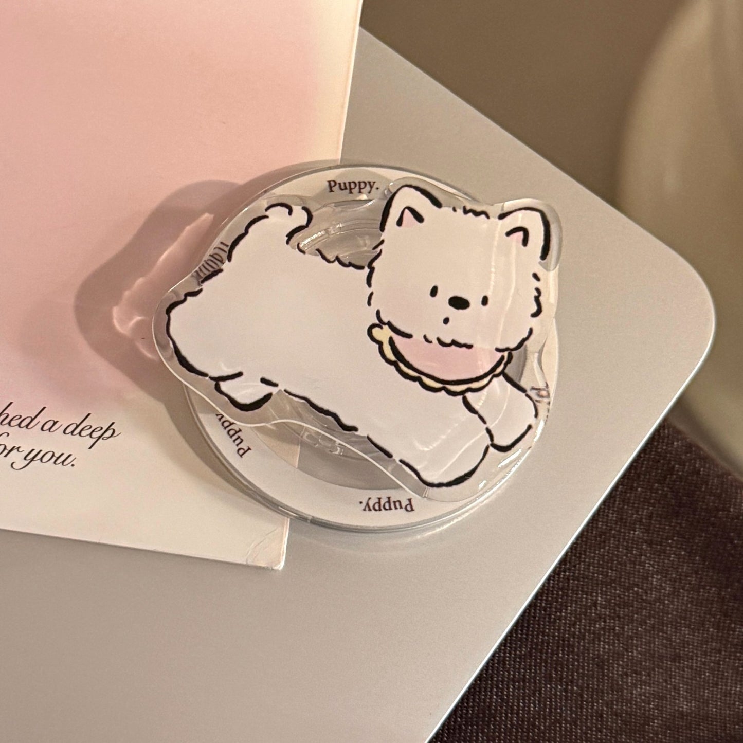 Verspielter Smartphone Fingerhalter im Hundedesign Brehn