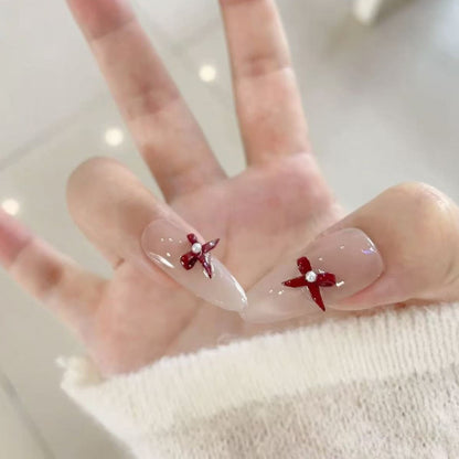 Elegante Stiletto Press-On Nägel mit dekorativen Akzenten Brehn