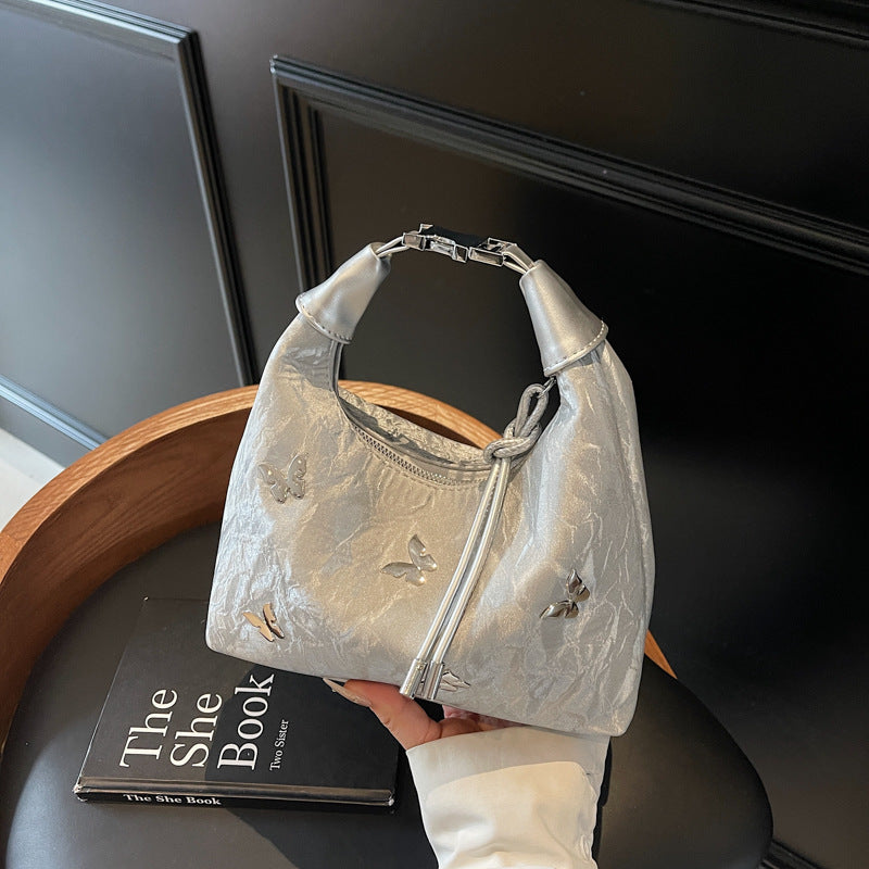 Stylische Handtasche mit Schmetterlingsdetail Brehn
