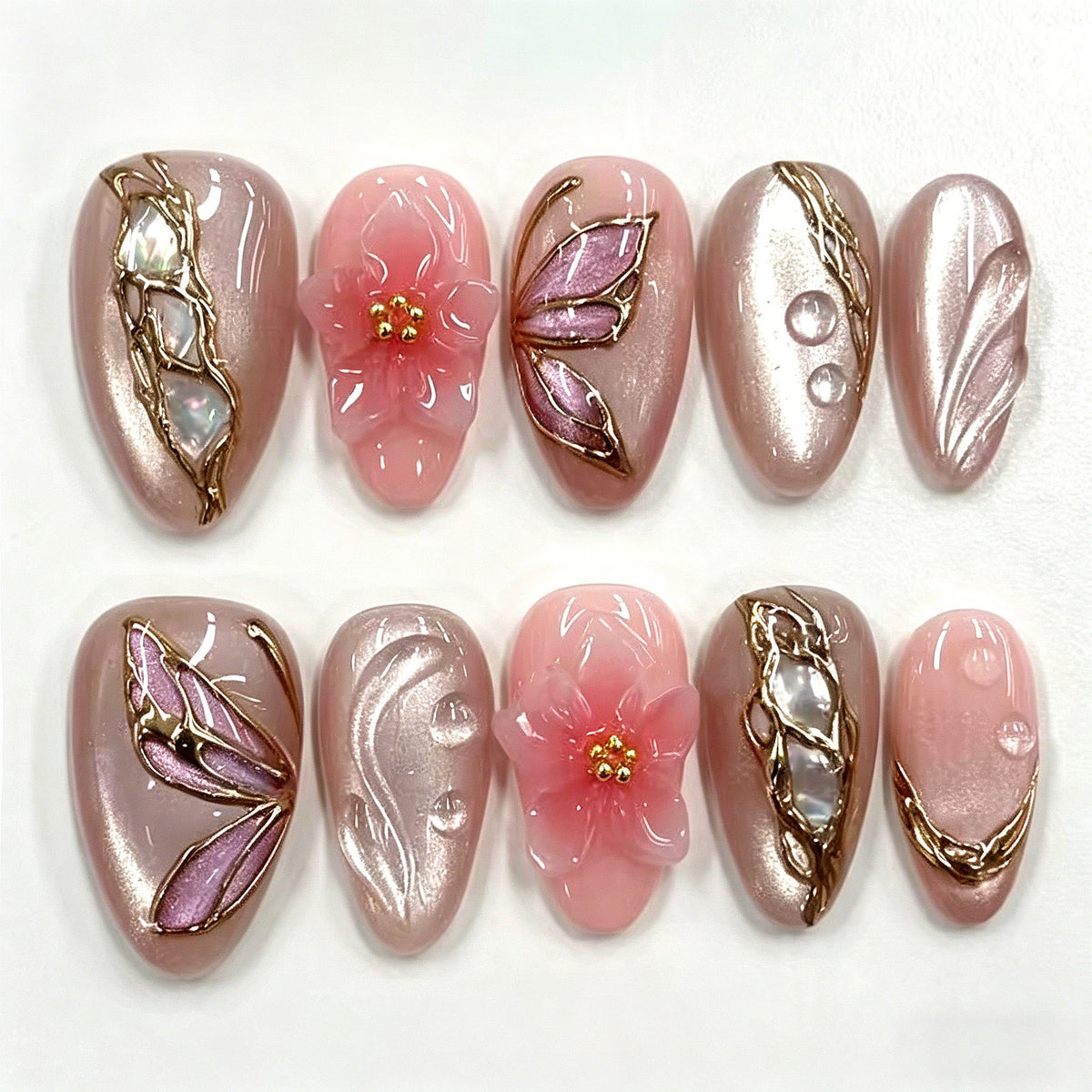 Künstlerisches Floral Press-On Nagelkunstset mit eleganten Edelsteindetails Brehn