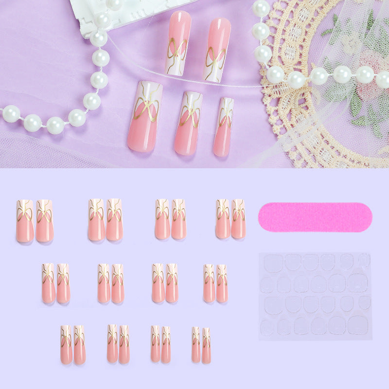 Dekorativer Press-On Nail Set mit künstlerischen Schleifen Designs Brehn