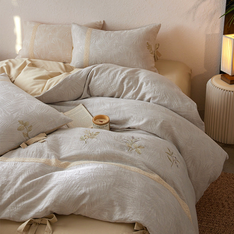 Premium-Baumwollbettbezug mit floraler Stickerei, Spitzenbiese und Schleifenverschluss
