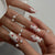 Künstlerisches Herz-Themen Press-On Nagelset Brehn