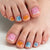 Kreatives Kunstnagelset mit floralen und bunten Designs Brehn