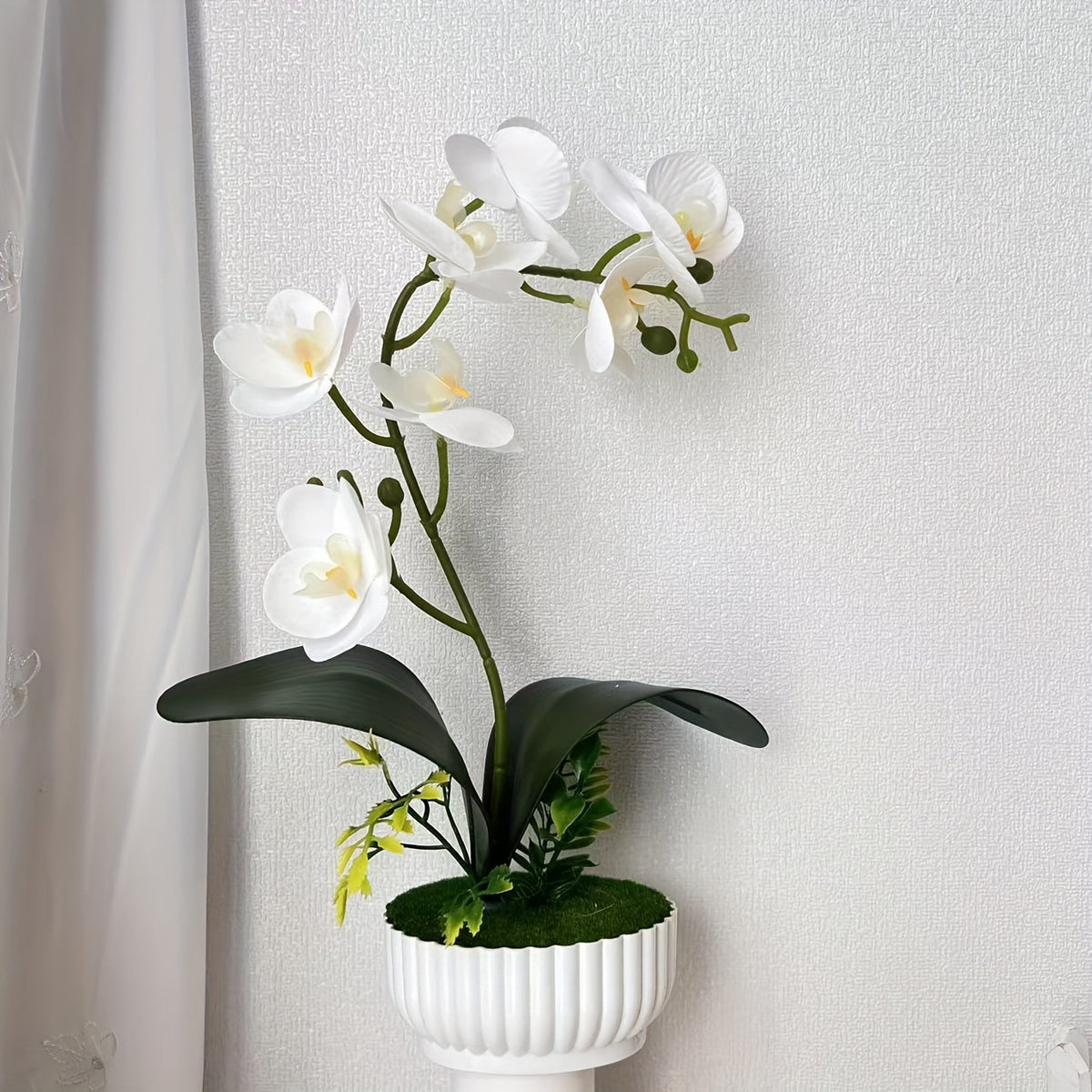 Elegante Faux-Orchideen-Anordnung für die Innendekoration