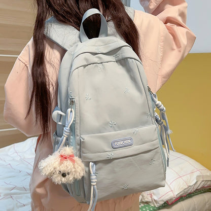 Stylischer Multi-Taschen Rucksack mit pelzigem Schlüsselanhänger Brehn