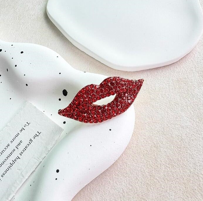 Glitzernde Lippenbrosche Brehn