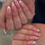 Künstlerische florale Nagelspitzen Brehn