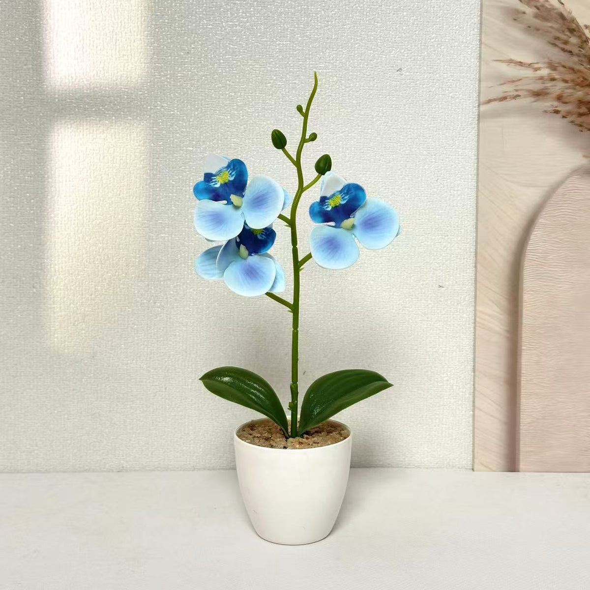 Elegante Kunst-Orchideen-Pflanzenschmuck