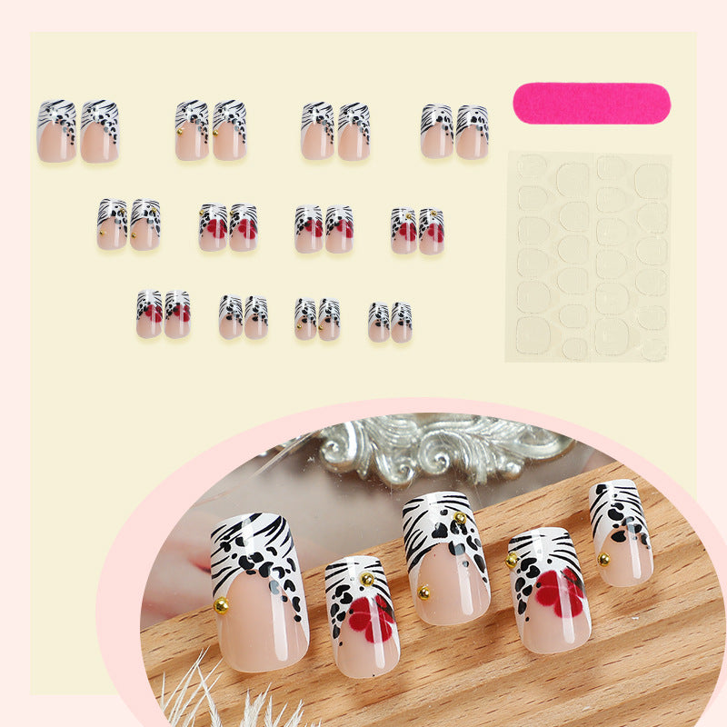 Kreatives Kunst Press-On Nagelset mit Blumen- und Zebra-Designs Brehn