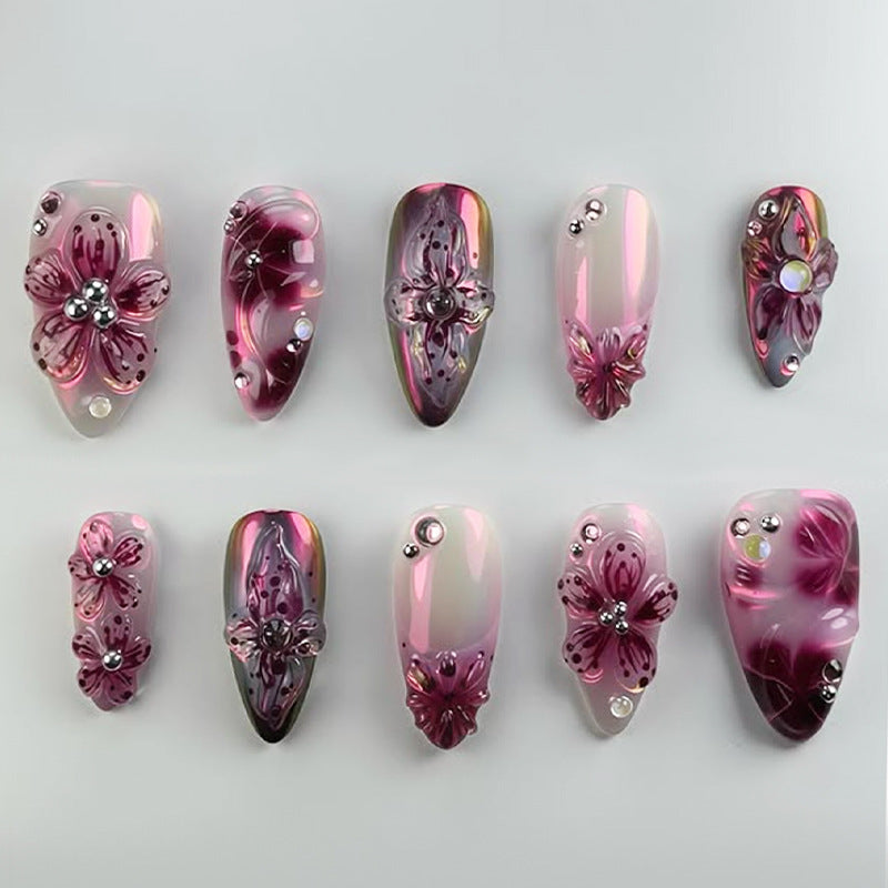 Kunstnagelset mit eleganten Blütenverzierungen Brehn