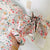 Damen Faltbarer Regenschirm mit floralem Design und niedlichen Details Brehn