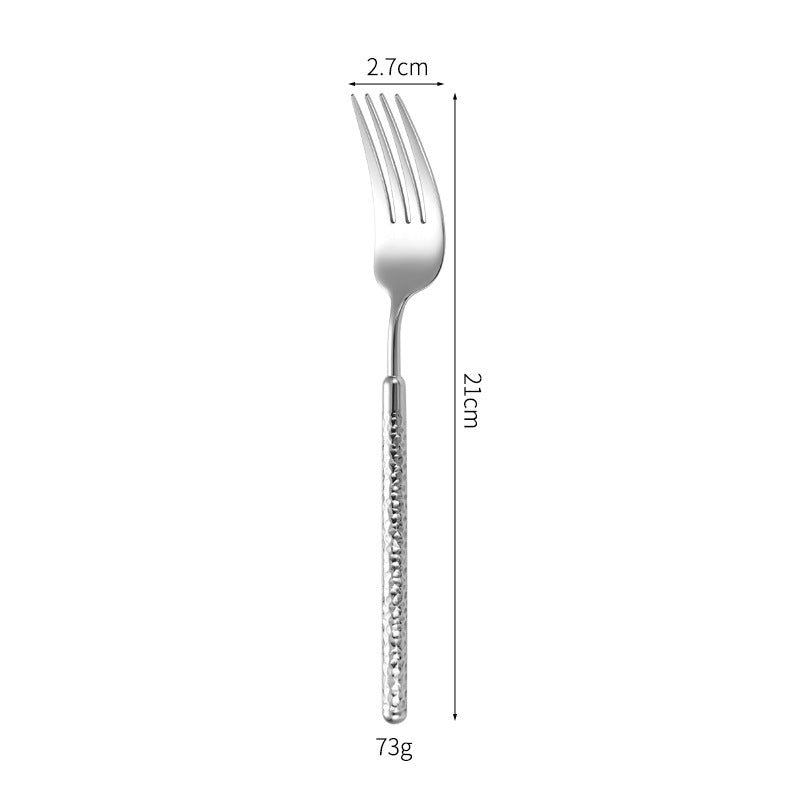 Eleganter Dessertlöffel mit Kunstvollem Griffdesign Brehn