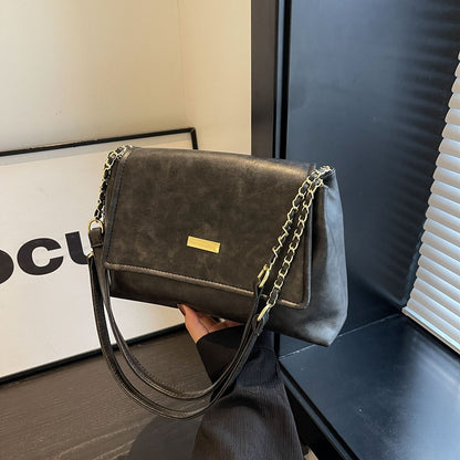 Kettengriff Handtasche