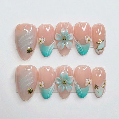 Künstlerisches Muscheln-inspiriertes Nagelset Brehn