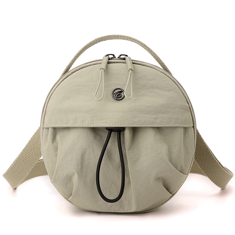 Runde Crossbody-Tasche Brehn