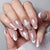 Elegante French Tip Press-On Nägel mit Schleifenakzenten Brehn
