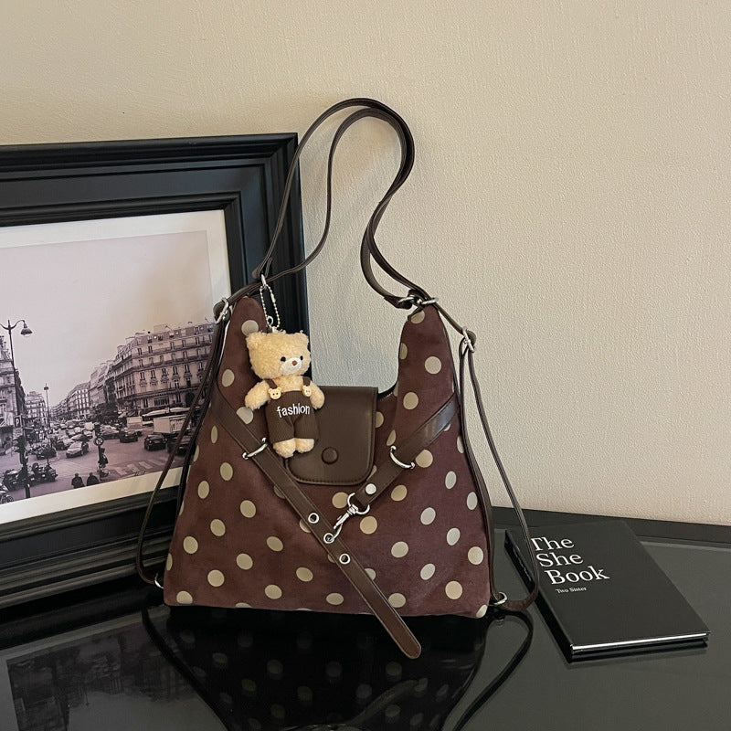 Modische gepunktete Schultertasche