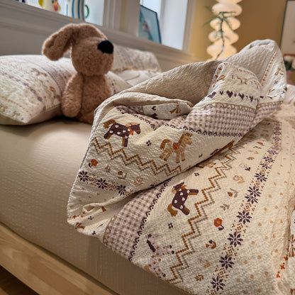 Gesteppte Baumwoll-Bettwäsche mit nordischem Rentier-Patchwork