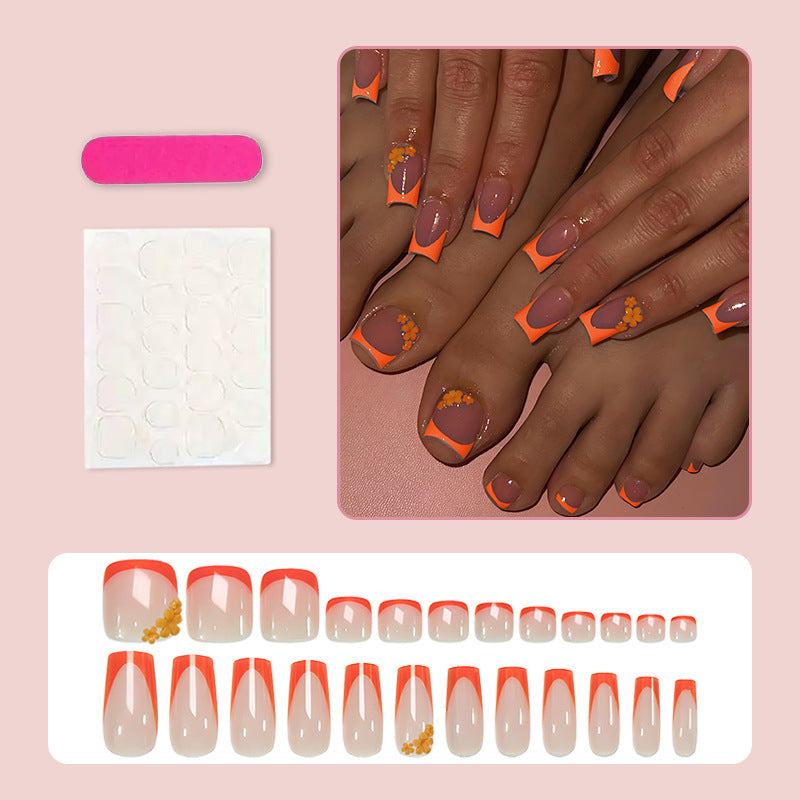 Kunstnagelset mit stilvollen orangen Neon-Akzenten Brehn