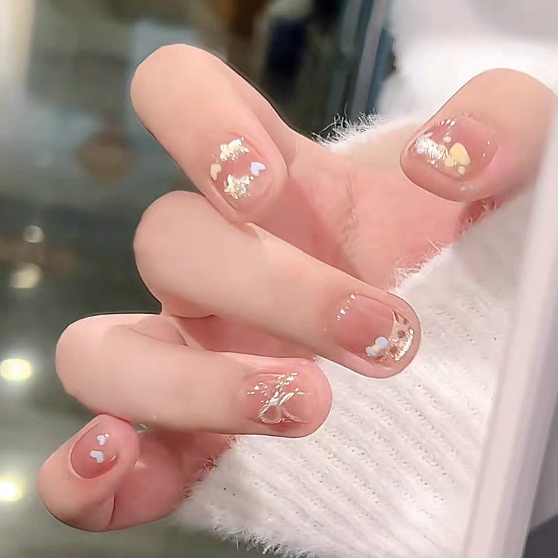 Künstlerische Press-On-Nagelverlängerungen mit floralen Verzierungen Brehn