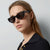 Damen Cat-Eye Sonnenbrille mit transparentem Rahmen und braunen Gläsern Brehn