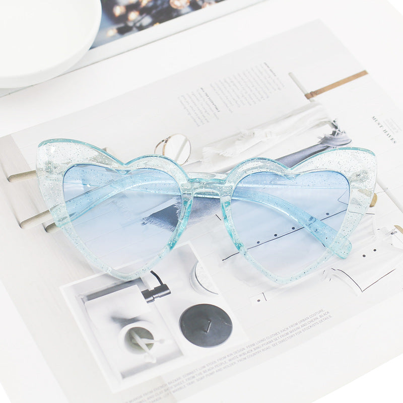 Damen Herzförmige Sonnenbrille mit glitzerndem Rahmen Brehn