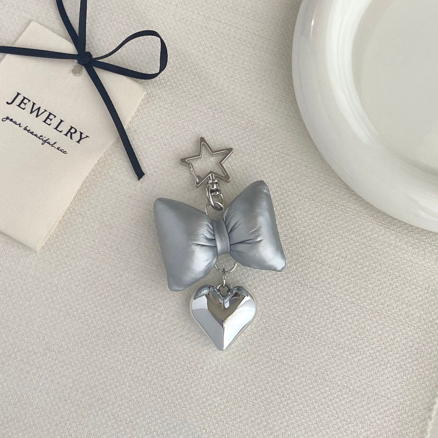 Bow-förmiger Charm Schlüsselanhänger Brehn