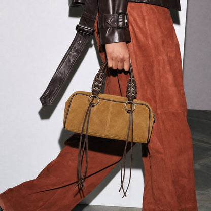 Luxuriöse Lederhandtasche mit geflochtenen Trägern