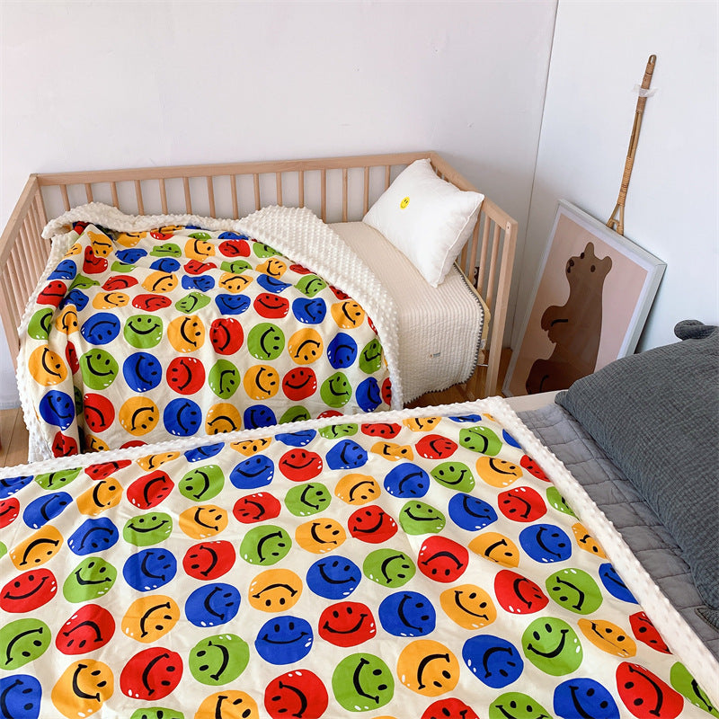 Kinder-Steppdecke mit buntem Dinosaurier-Print und weicher Minky-Borte