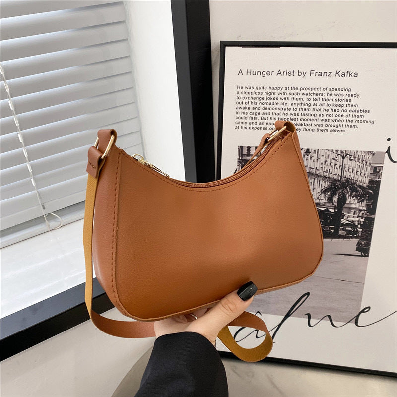 Elegante Handtasche Im Geschwungenen Design Brehn