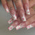 Kunstnagelset mit floralen Designs und eleganten Verzierungen Brehn