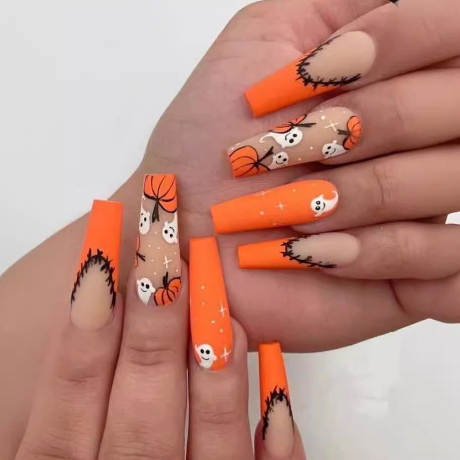 Künstlerisches Press-On Nageldesign mit Tropfeneffekt Brehn