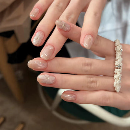Künstlerische florale Press-On Nagelverzierungen