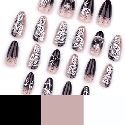 Kunstvolle Stiletto-Nägel mit filigranen Verzierungen und Glamour-Akzenten Brehn