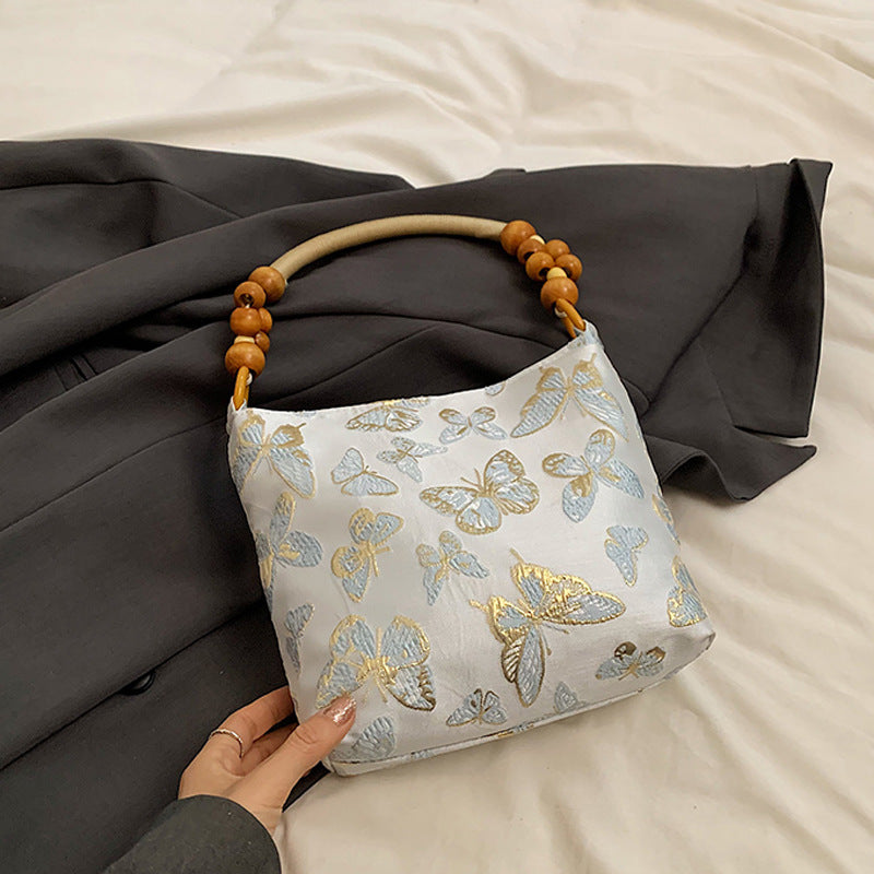 Elegante Schmetterlingsdruck-Handtasche