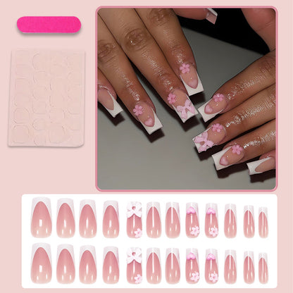 Kunstnagelset mit romantischen Blüten und eleganten Akzenten Brehn