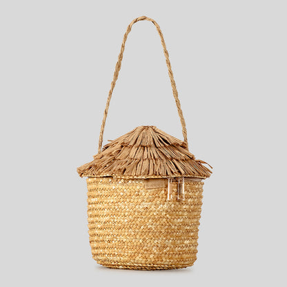 Rustikale hausförmige Strohtasche