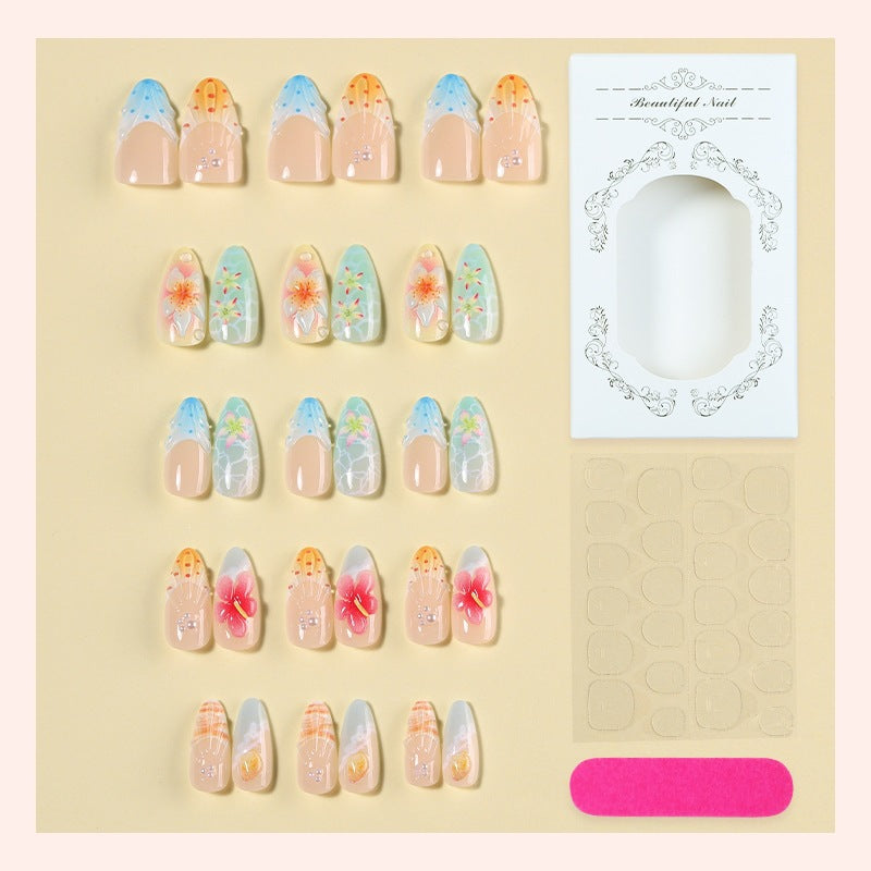 Kunstnagelset mit farbenfrohen Blumen- und maritimen Designs Brehn